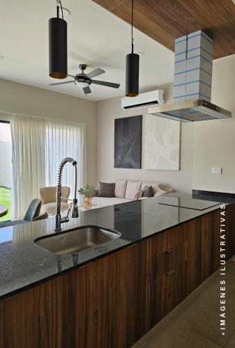 1082-39459-Townhouse-de-2-Recamaras-y-estudio-en-venta-en-Privada-en-Dzitya-Merida-1.jpg